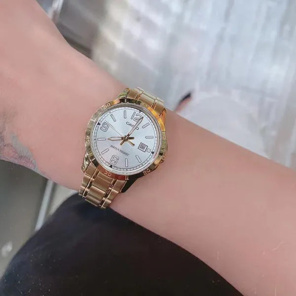 Casio női aranyszínű nemesacél karóra, ezüst számlap, dátum, 30 mm