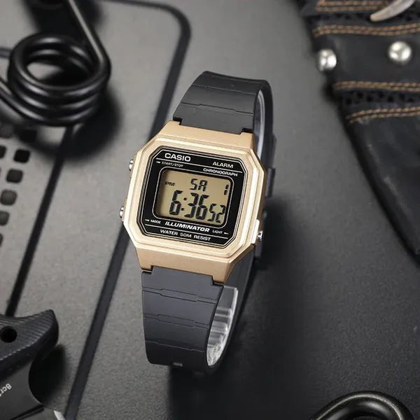 Casio W-217HM-9A uniszex digitális karóra, arany tok/fekete szíj, 50 m vízálló