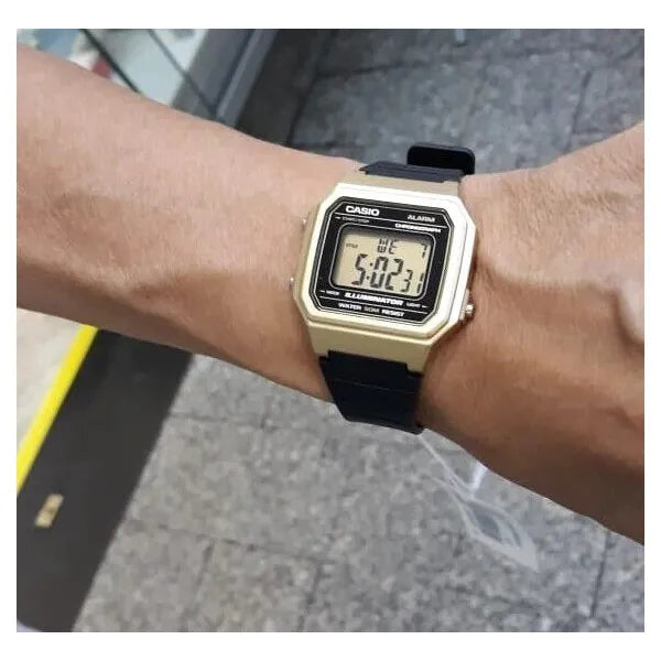 Casio W-217HM-9A uniszex digitális karóra, arany tok/fekete szíj, 50 m vízálló