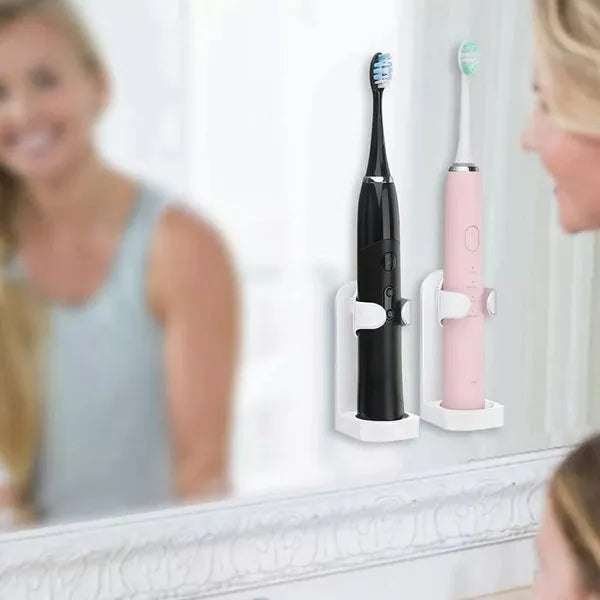 Falra szerelhető elektromos fogkefe tartó