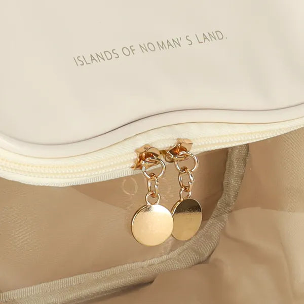 Utazó kozmetikai táska bézs, átlátszó előlappal 25×12×18 cm