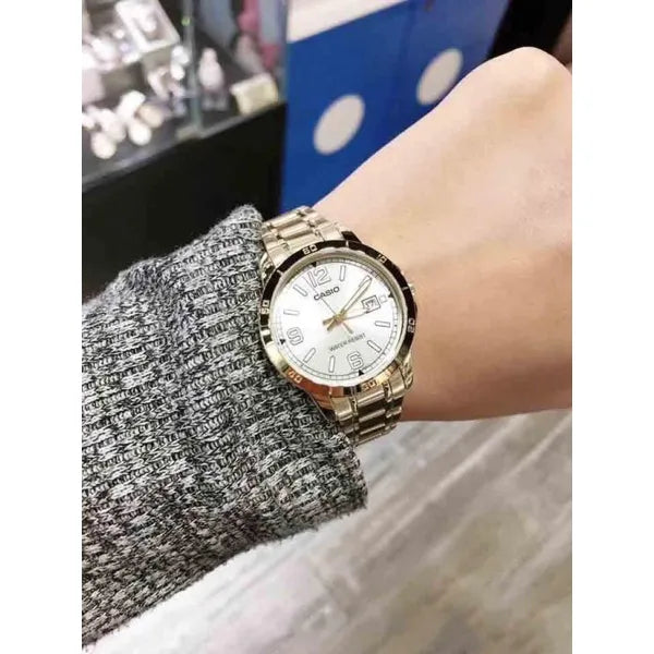 Casio női aranyszínű nemesacél karóra, ezüst számlap, dátum, 30 mm