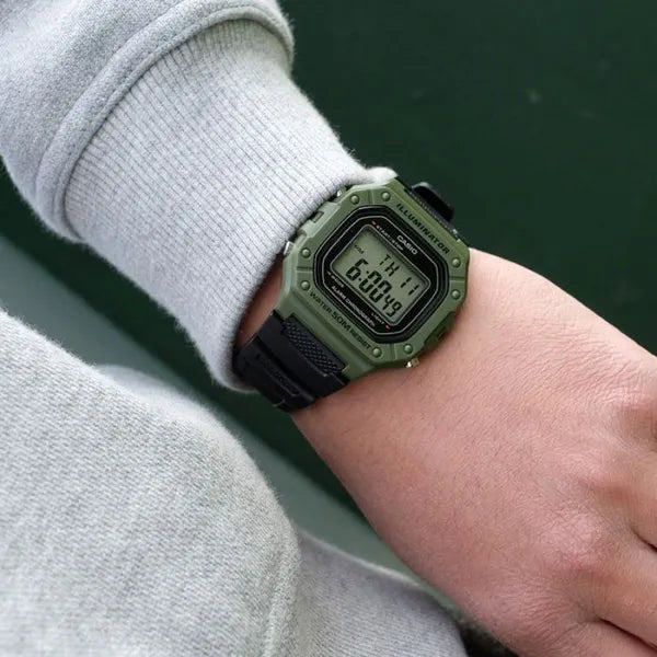 Casio W-218H-3A unisex digitális karóra, 43 mm, WR50, LED, fekete/zöld