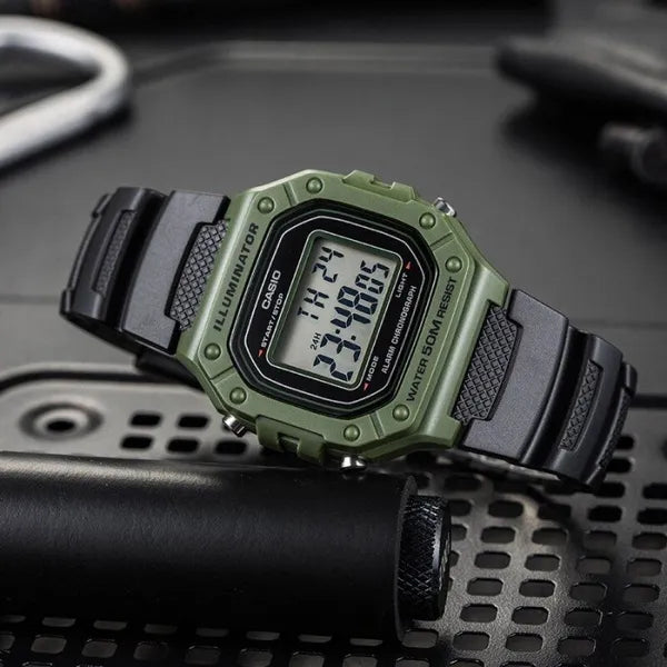 Casio W-218H-3A unisex digitális karóra, 43 mm, WR50, LED, fekete/zöld