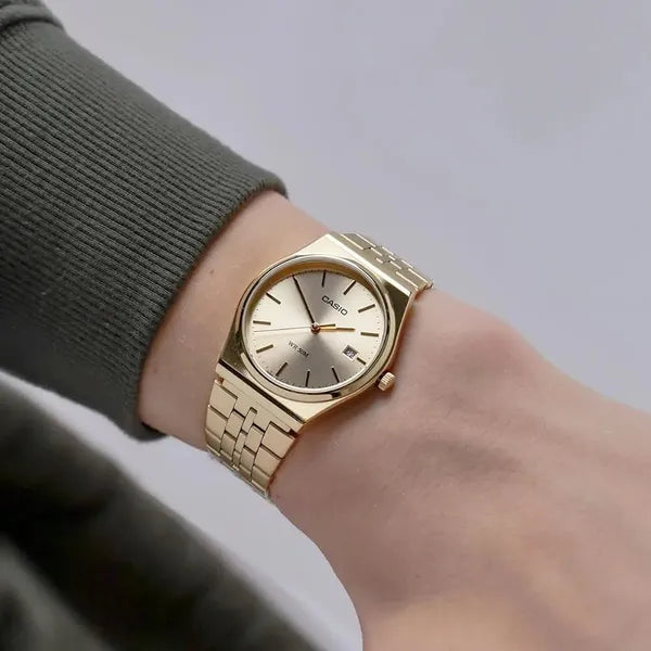 Casio MTP-B145G-9A férfi karóra, rozéarany számlap, arany acél, WR50