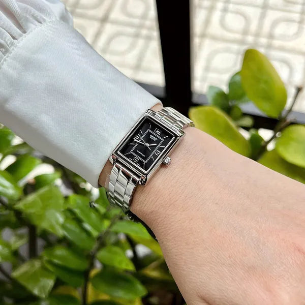 Casio női karóra LTP-1234DD-1A, acél szíj, fekete téglalap számlap, WR30