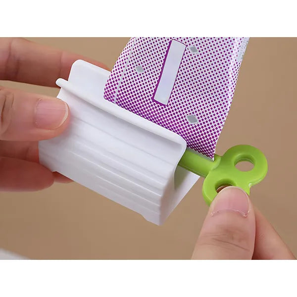 Műanyag fogkrém- és krémtubus kinyomó kulcs, max. 5 cm szélesség