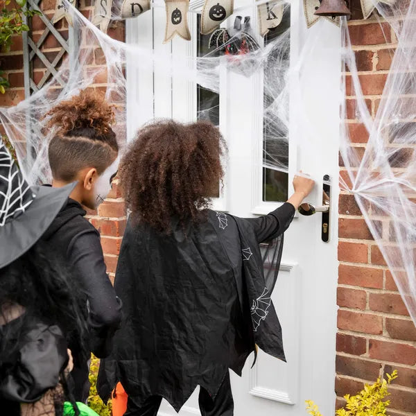 Halloween pókháló dekoráció 60 g, fehér poliészter, 2 pókkal
